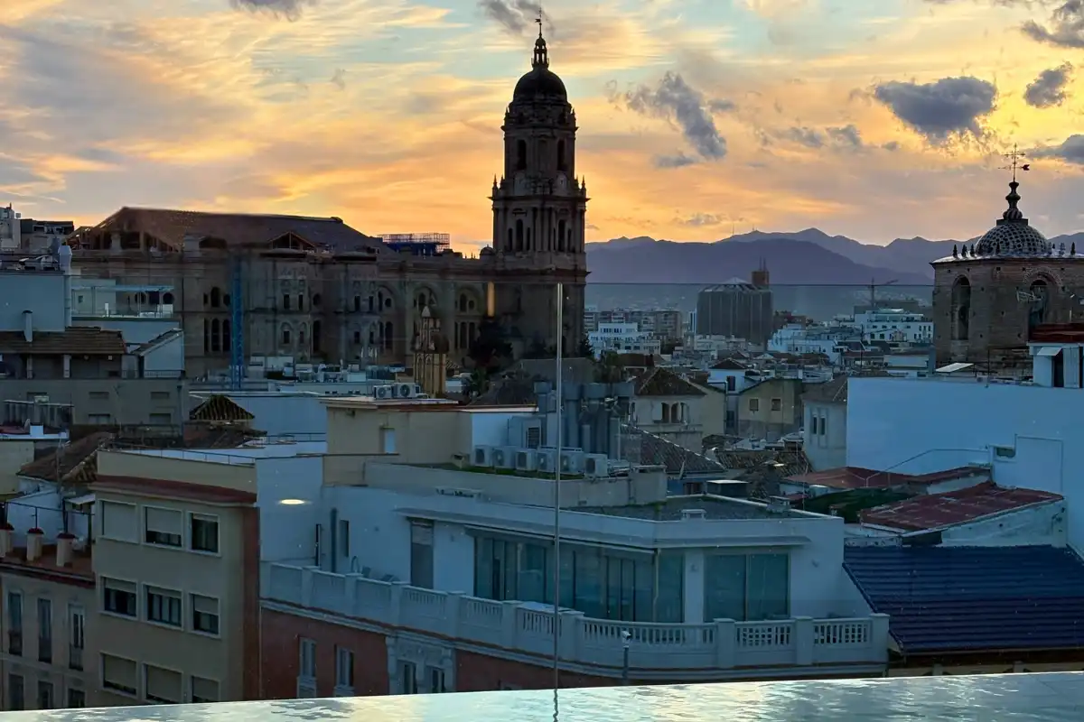 Cañitas Maite rooftop bar at ME Málaga with Alcazaba fortress views at sunset