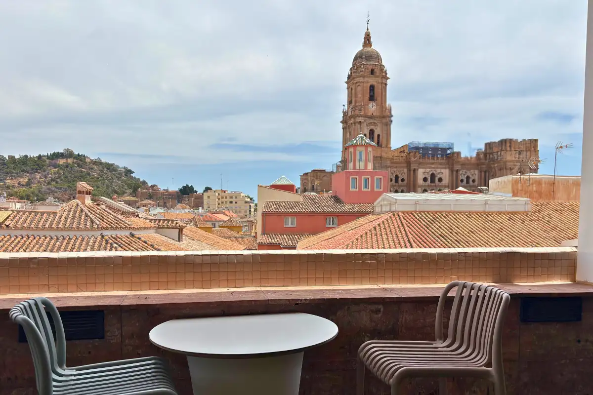 Terrace table with cathedral and rooftop views at La Terraza de Larios in Malaga